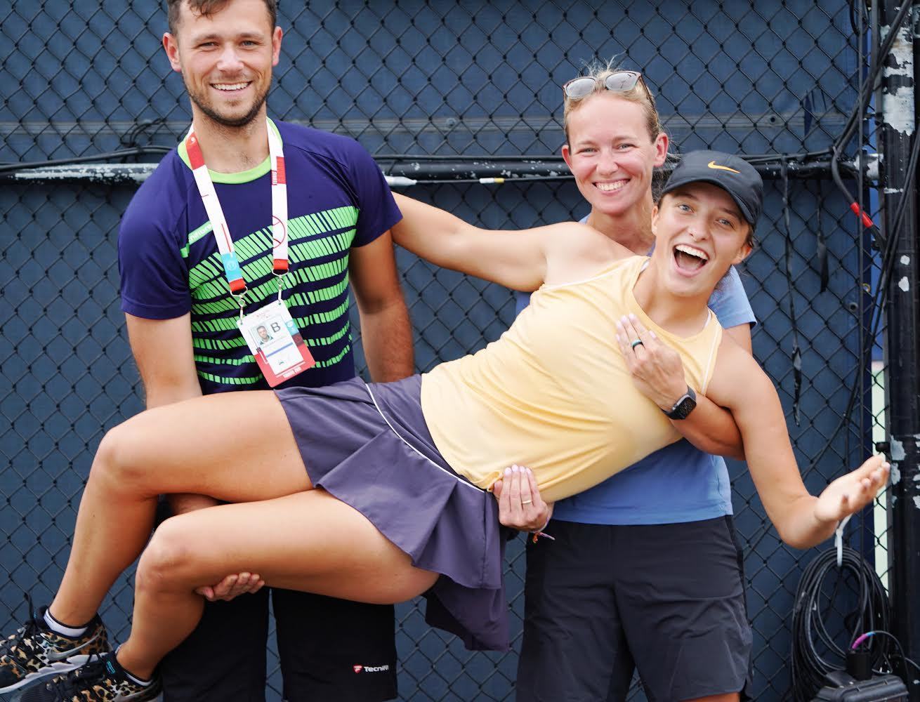Carrying a player off court after a win