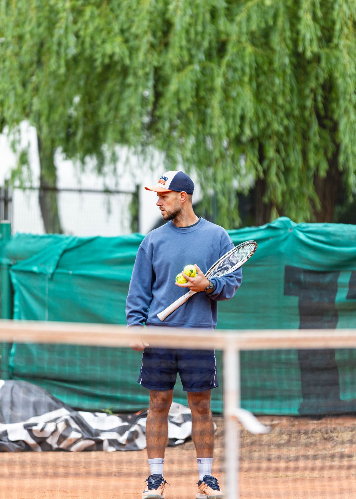 Between points at the back of the court