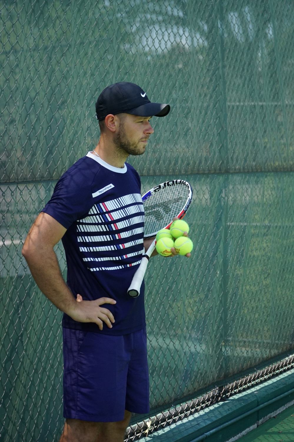 Carrying rackets and balls to court