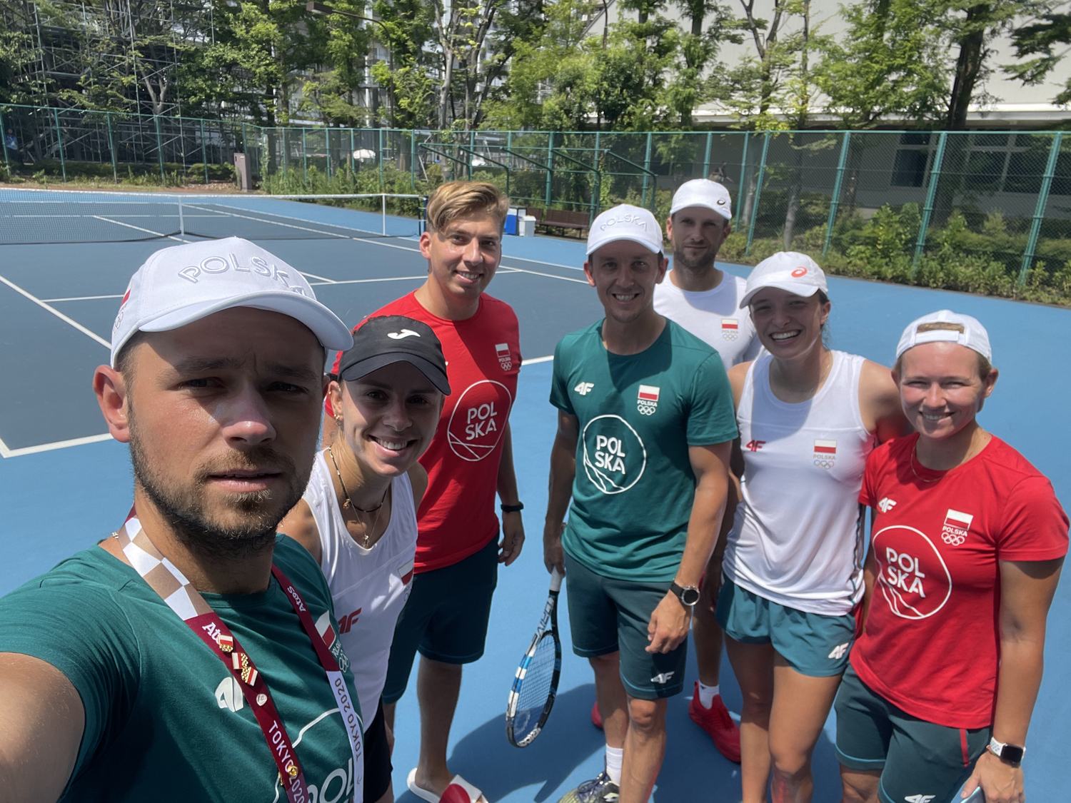 The Polish tennis group on a practice court in Tokyo