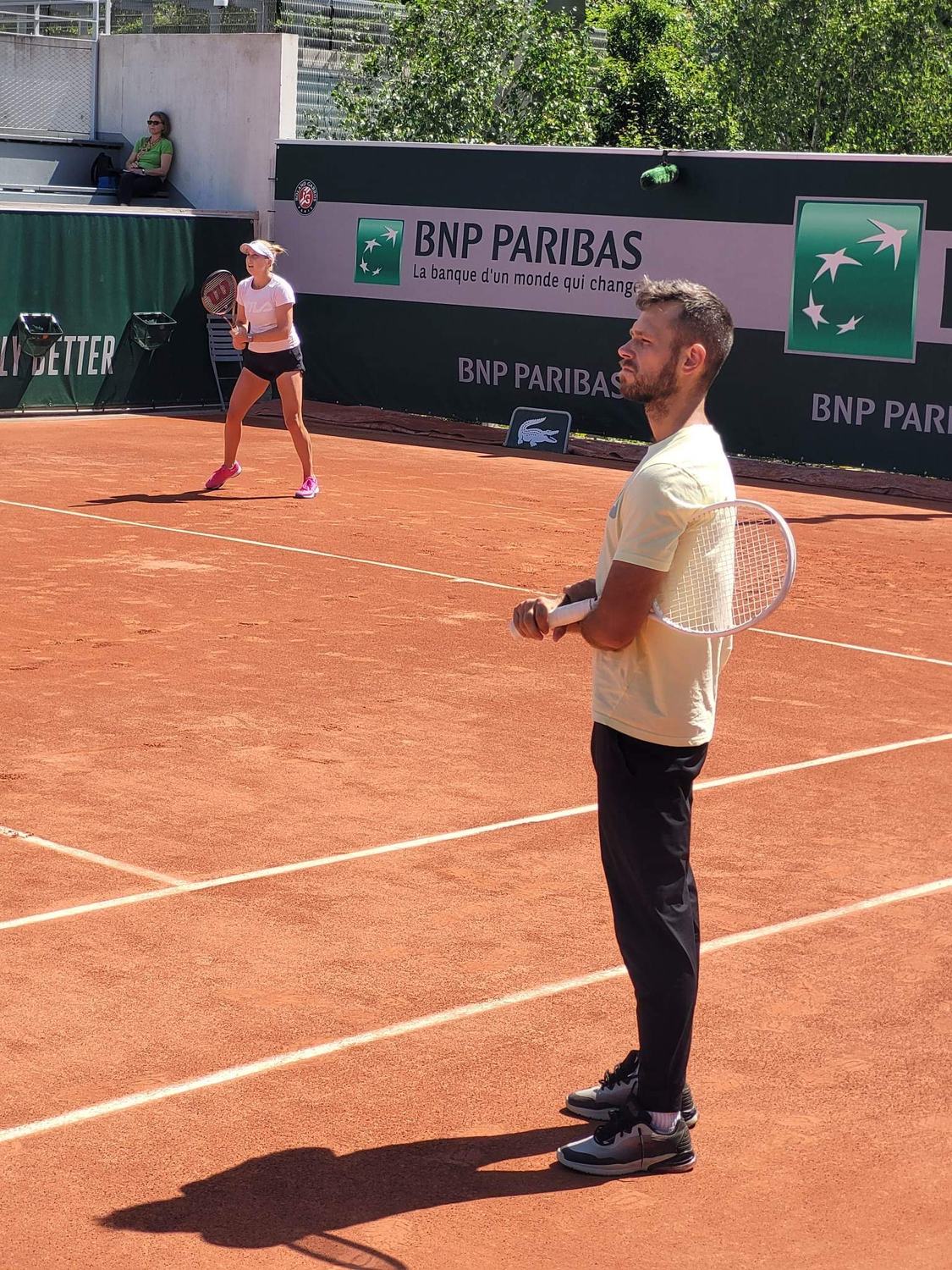 Coaching on a clay court